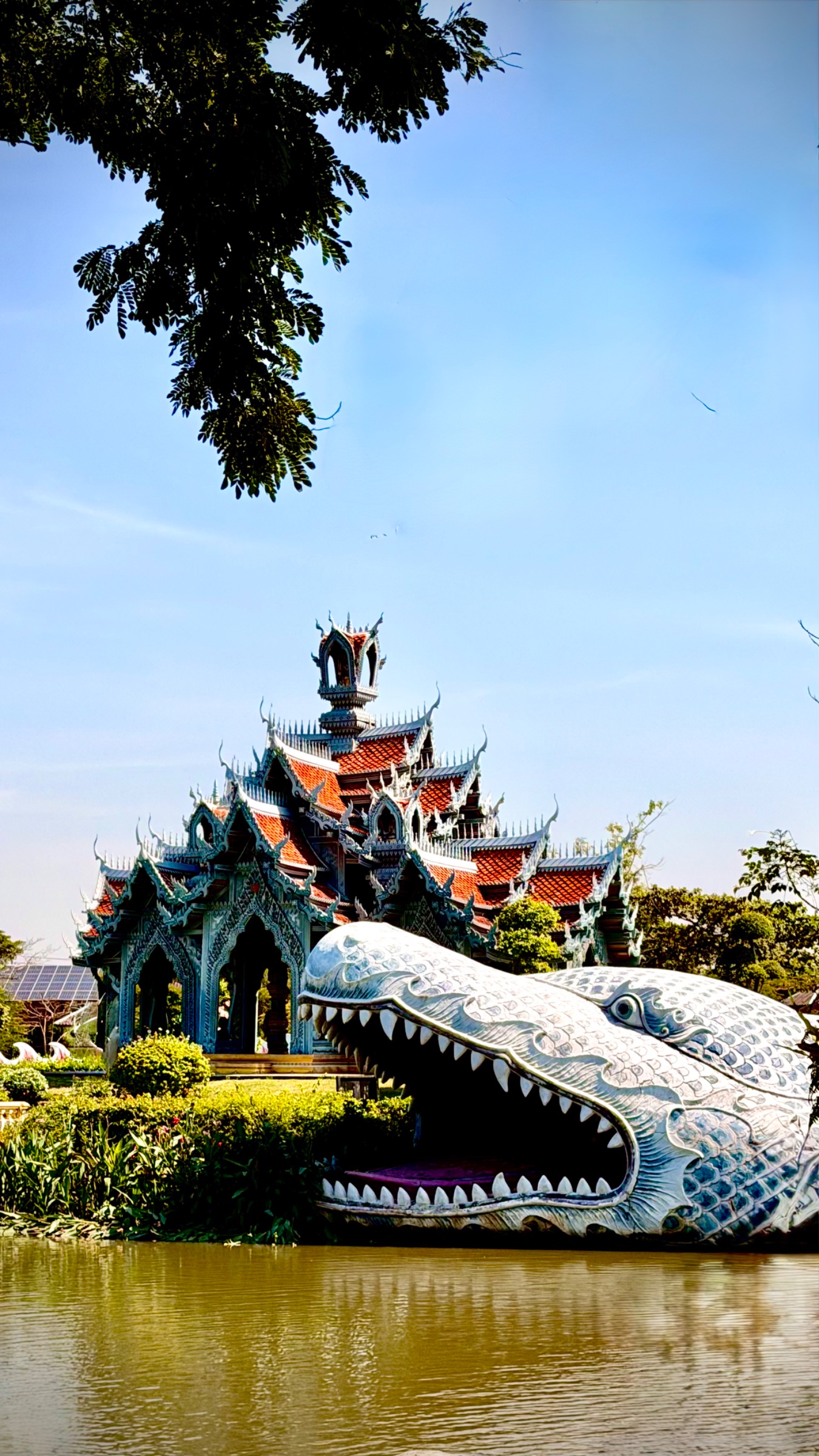 Island temple with dragon wrapped around it